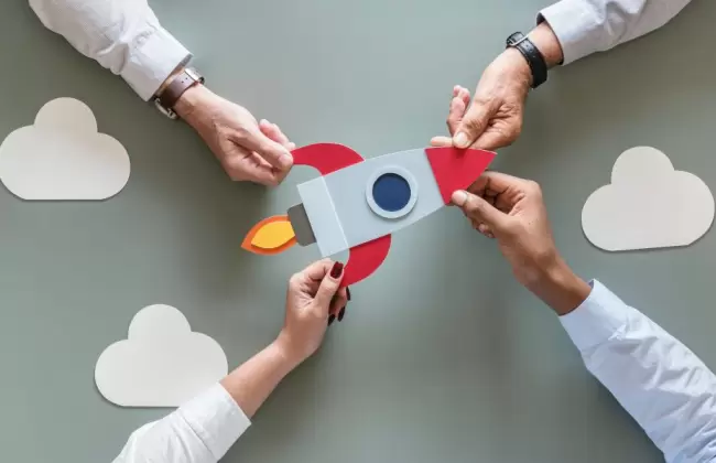 business-people-with-startup-rocket