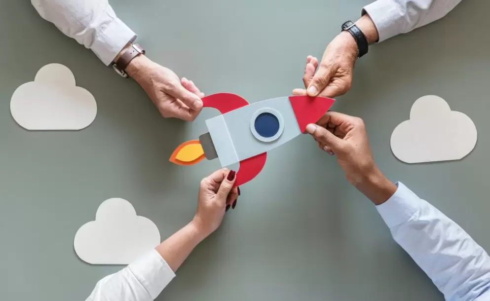 business-people-with-startup-rocket