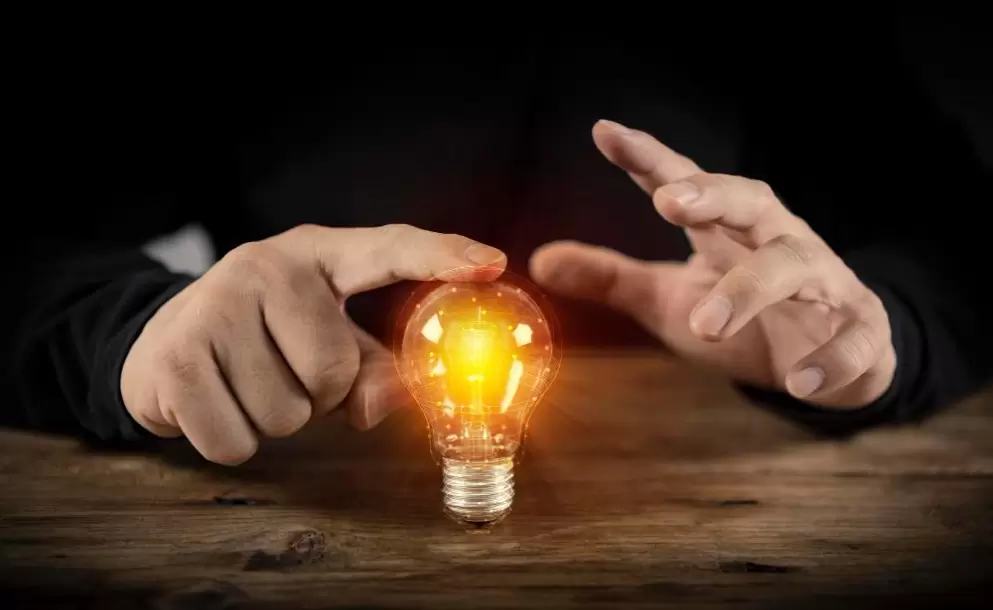 businessman-touching-bright-light-bulb-concept-of-ideas-for-presenting-new-ideas-great-inspiration-and-innovation